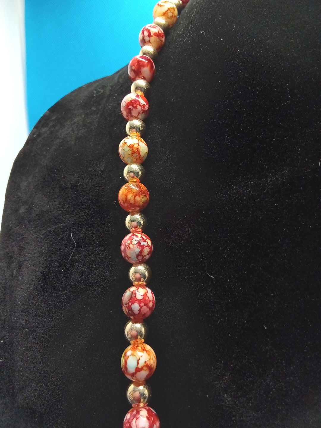 Red tone necklace